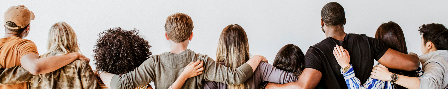 Rearview,Of,Diverse,People,Hugging,Each,Other